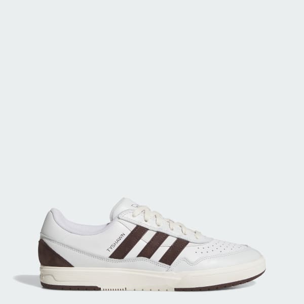 witte schoen met bruine strepen